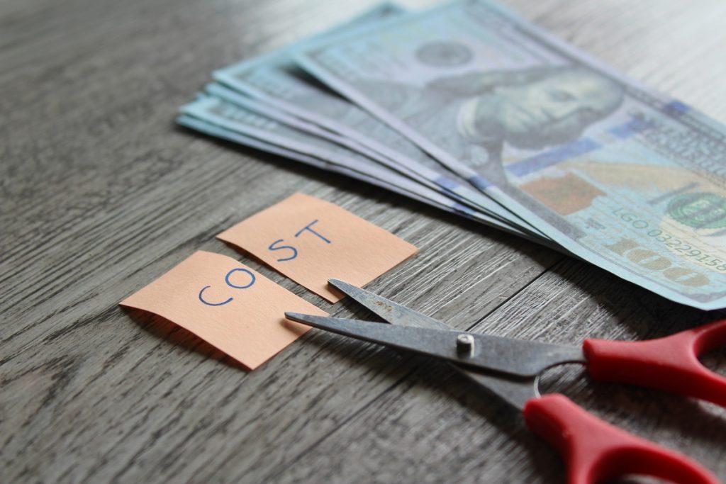 scissors and money