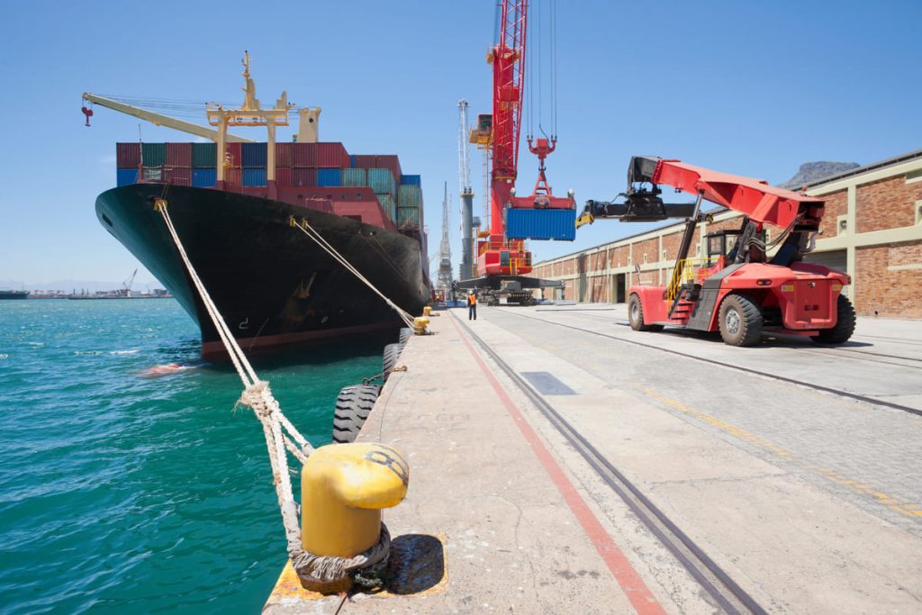 crane moving towards boat