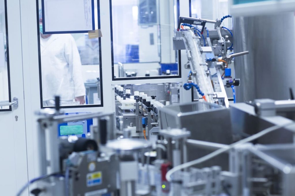 machine sorting pharmaceutical bottles