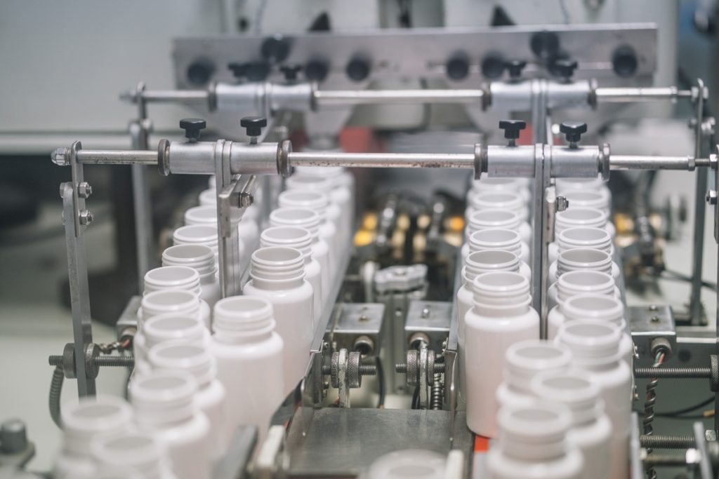 picture of manufacture of pills and encapsulation.