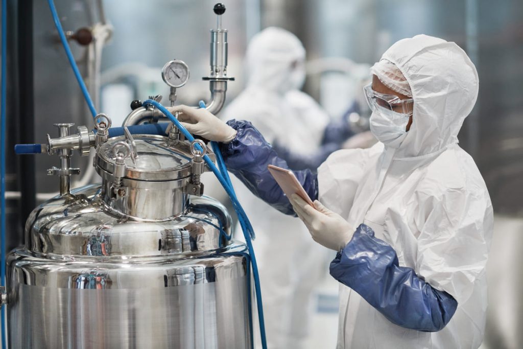 woman operating pharma equipment